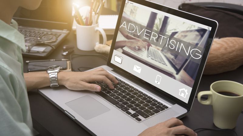 A Marketer Promoting a New Product to Customers Using Digital Advertising
