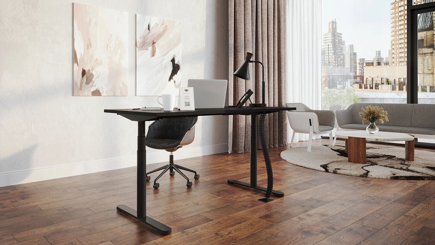 3D visualization of a home office setup with black desk, chair, and sofa in a bright room