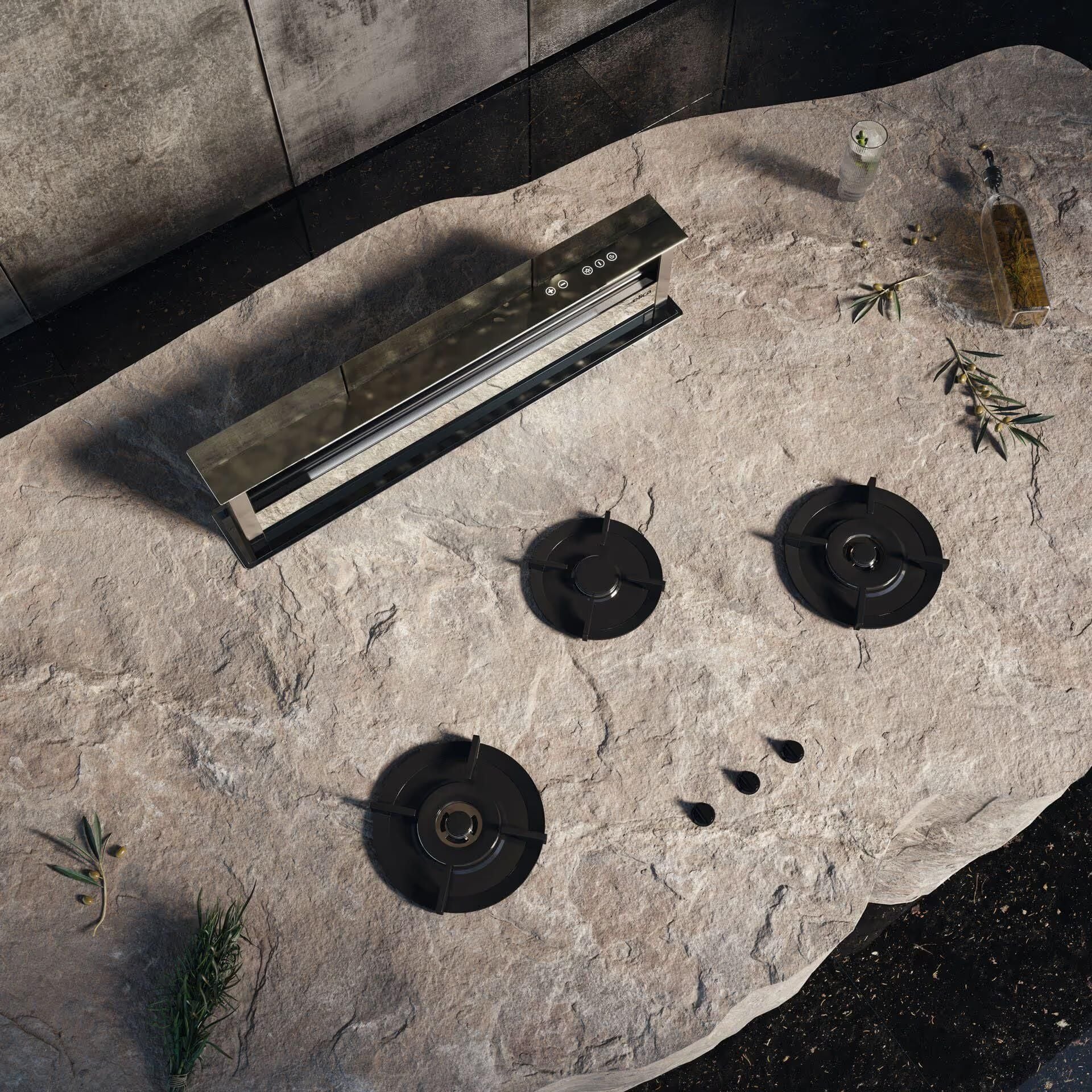 Product rendering with a compositional background using stone textures and themed props to highlight a modern kitchen appliance