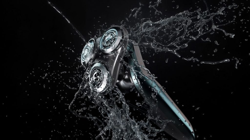 3D Product Rendering of Electric Shaver with Water Splash