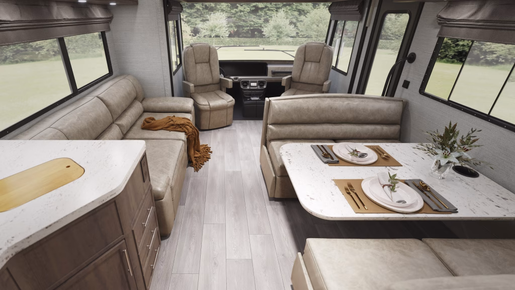 Flooring product rendering of Columbian Oak vinyl planks in an RV interior with leather seating and a dining area