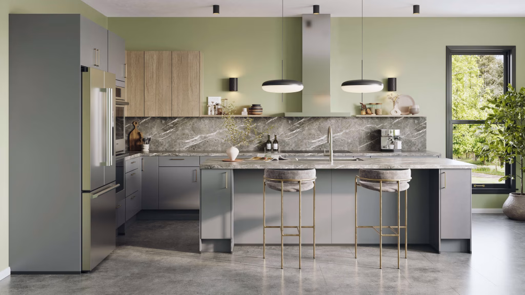 Lifestyle 3D visualization of a spacious kitchen with sage green walls, gray cabinets, marble backsplash, and gold bar stools