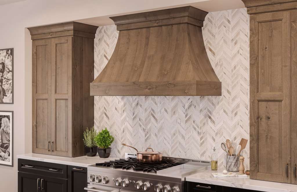 3D visualization close-up of a curved rustic wood range hood with herringbone tile backsplash and copper pot