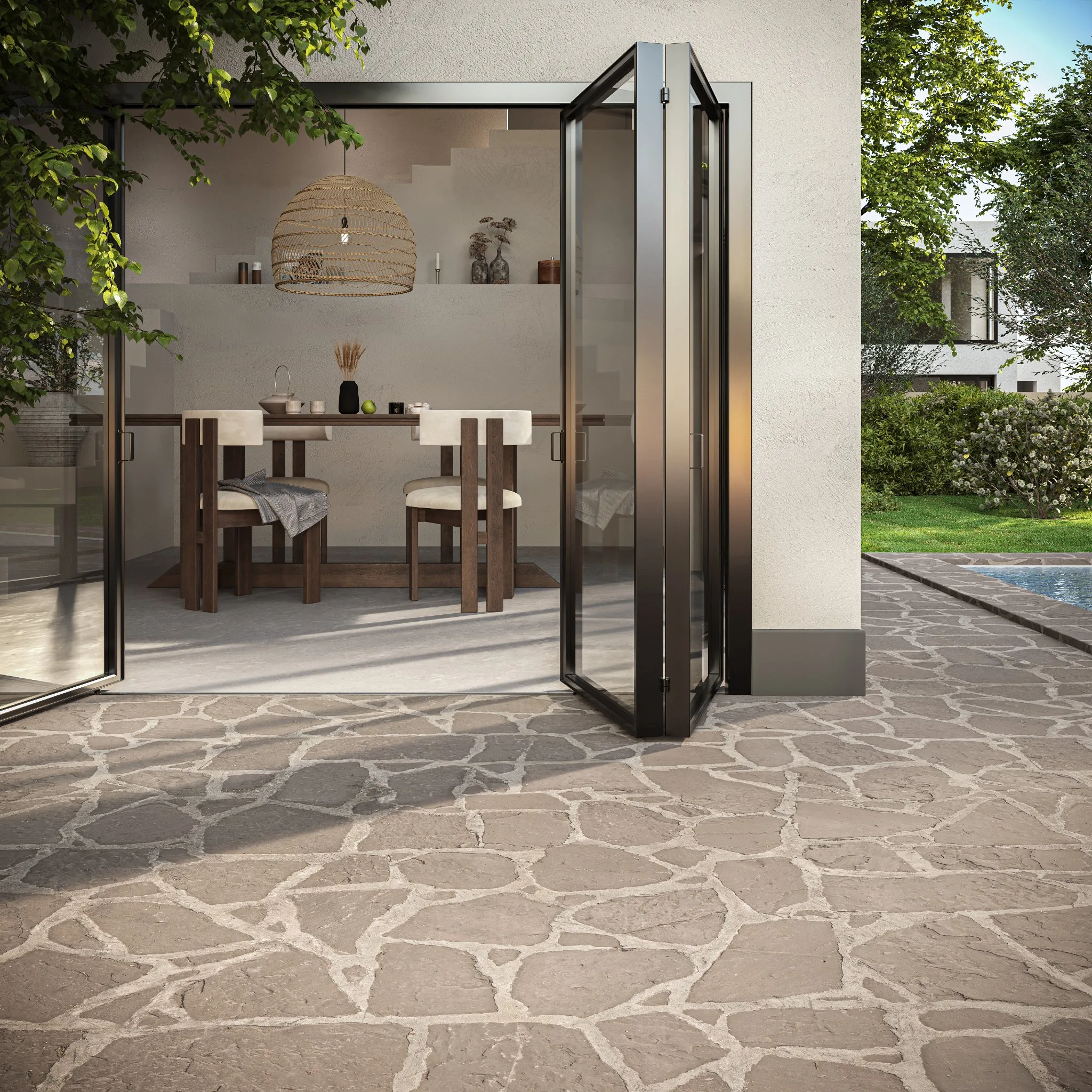 3D rendering of a flagstone terrace outside open folding glass doors