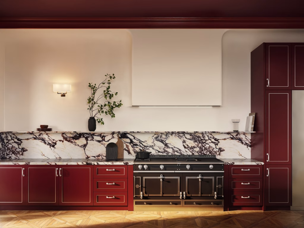 3D visualization of a burgundy enamel range wall with OCTAVIA drawers, a tall pantry cabinet, a black French range and a marble backsplash with a ledge