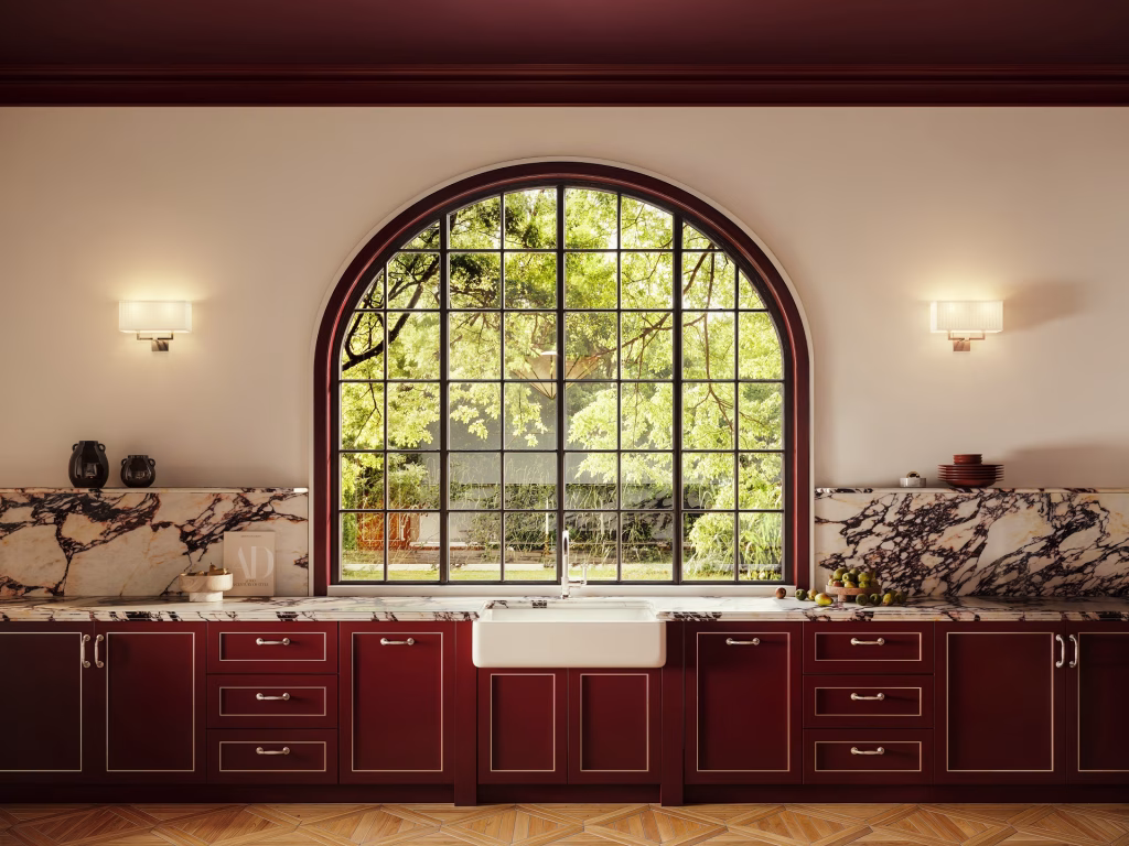 Front-view CGI of OCTAVIA base cabinets in custom Burgundy Enamel with fine inset lining, a white farmhouse sink and a violet-veined marble backsplash under an arched steel window