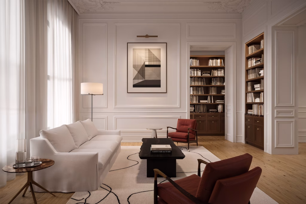 3D visualization of a high-ceilinged New Orleans living room with white boiserie, red leather armchairs and walnut built-in bookcases framing the doorways