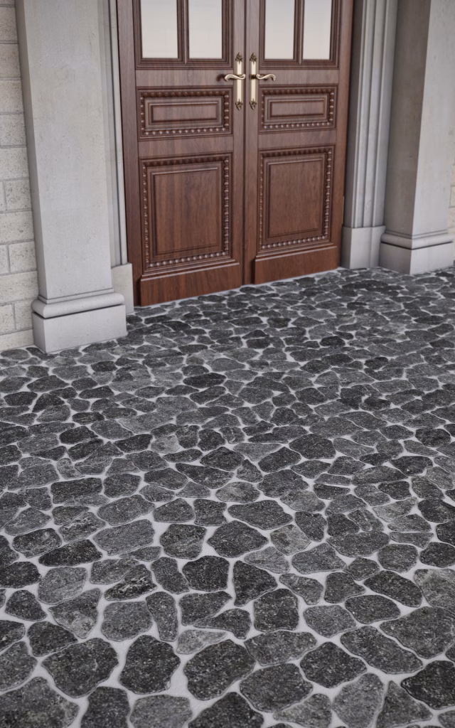 Close-up render of Cobbles Tumbled marble in black on a porch floor by a carved wooden door