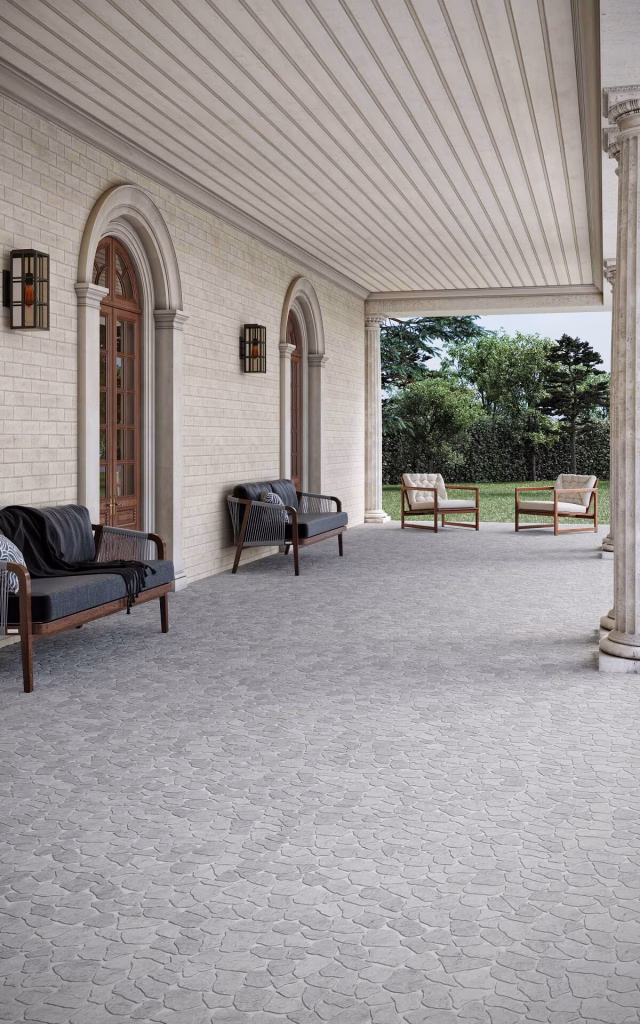 3D render of a columned porch floored in light grey Cobbles Tumbled marble