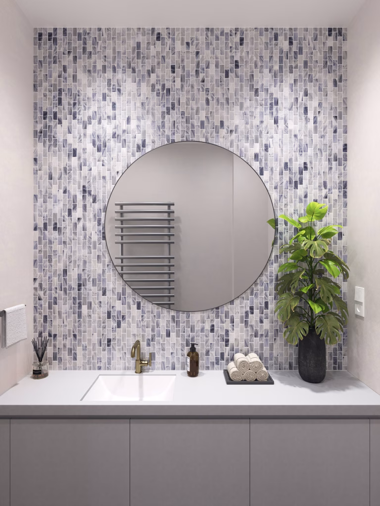 3D render of a bathroom vanity wall in Sea Shadows glass mosaic behind a round mirror