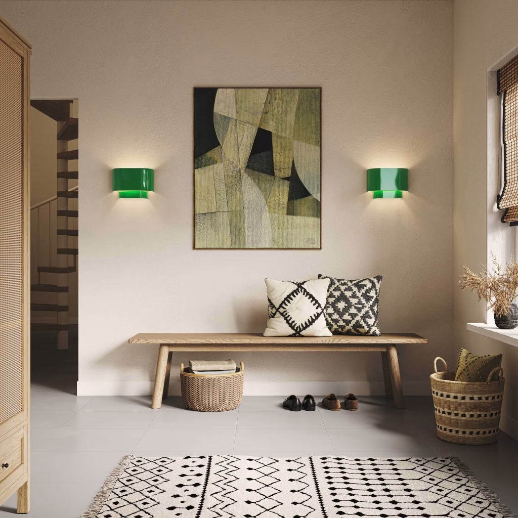 3D rendering of two glossy green Livex Springview wall sconces flanking an abstract painting above an oak entryway bench